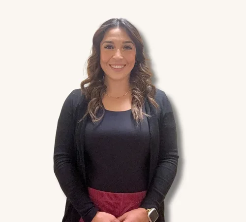 Portrait of Anissa Baldonado standing against a plain light background