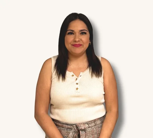 Portrait of Marcela Esparza standing against a plain white background