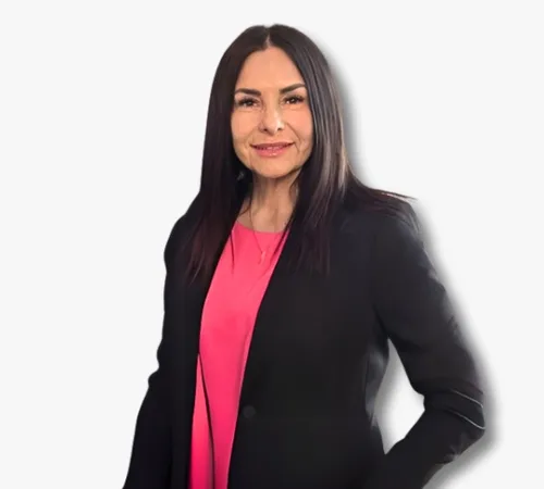 Portrait of Margie Apodaca in a black blazer and bright pink top