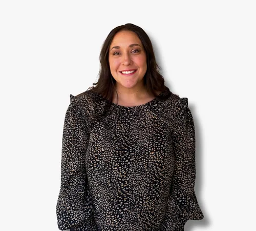 Portrait of Gabrielle Jordan in a black patterned blouse on a white background
